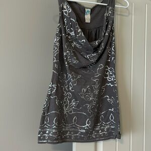 Full of feminine detail tank.